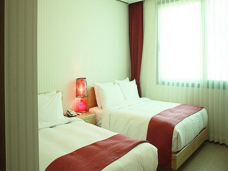 Hotel California Seogwipo Bagian luar foto